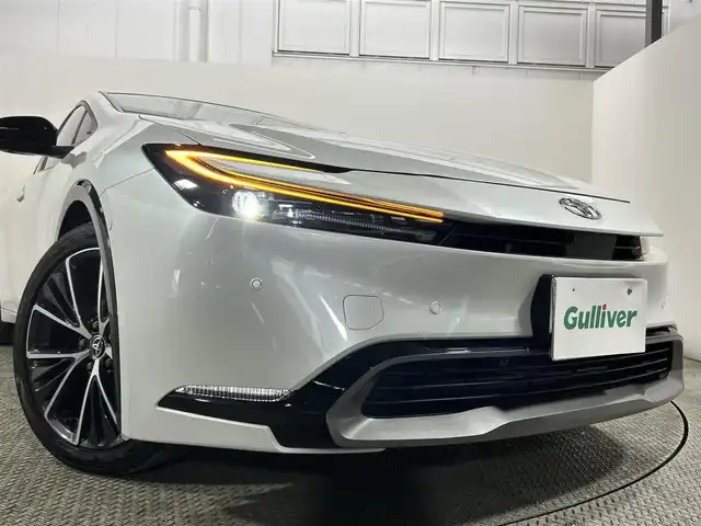 トヨタ プリウス Z 大阪府 2024(令6)年 0.7万km プラチナホワイトパールマイカ サンルーフ　３６０カメラ　純正ナビ（フルセグＴＶ／Ｂｌｕｅｔｏｏｔｈ）　パーキングアシスト　衝突軽減　デジタルインナーミラー　ＥＴＣ　電動リアゲート　パワーシート　シートヒーター　ハンドルヒーター