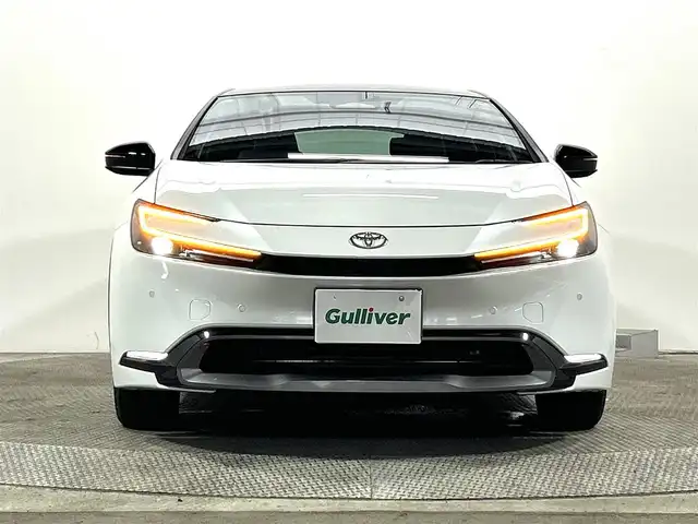 トヨタ プリウス Z 大阪府 2024(令6)年 0.7万km プラチナホワイトパールマイカ サンルーフ　３６０カメラ　純正ナビ（フルセグＴＶ／Ｂｌｕｅｔｏｏｔｈ）　パーキングアシスト　衝突軽減　デジタルインナーミラー　ＥＴＣ　電動リアゲート　パワーシート　シートヒーター　ハンドルヒーター