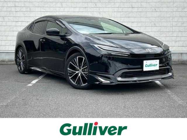 トヨタ プリウス G 大阪府 2023(令5)年 1.2万km アティチュードブラックマイカ ワンオーナー/モデリスタエアロ/純正ディスプレイオーディオ/バックカメラ/衝突被害軽減システム/レーンキープアシスト/コーナーセンサー/オートマチックハイビーム/オートライト/純正アルミホイール/純正フロアマット/シートヒーター/ドライブレコーダー/2.0ETC/プッシュスタートボタン/LEDヘッドライト/スペアキー×1