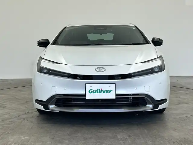 トヨタ プリウス G 三重県 2023(令5)年 1.3万km プラチナホワイトパールマイカ 禁煙車/純正８型ナビ　/バックカメラ　/オプション１９インチＡＷ　/車高調（ノーマルサス積込）　/ＢＳＭ　/社外デジタルミラー型ドラレコ　/１００Ｖ電源　/衝突軽減ブレーキ/レーダークルーズコントロール　/ＥＴＣ２．０　/ＬＥＤライト/オートライト/オートハイビーム機能