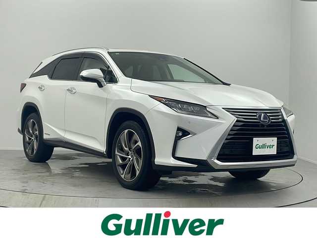 レクサス ＲＸ 450hL 大阪府 2019(平31)年 3.8万km ソニッククォーツ 純正12.3インチナビ/・TV/・SD/・Bluetooth/・AUX/・AMFM/・CD/DVD/・パノラミックビューモニター/サンルーフ/シートヒーター/エアシート/ステアリングヒーター/電動パーキングブレーキ/電動格納サードシート/追従型クルーズコントロール/メモリーシート/クリアランスソナー/BSM/ヘッドアップディスプレイ