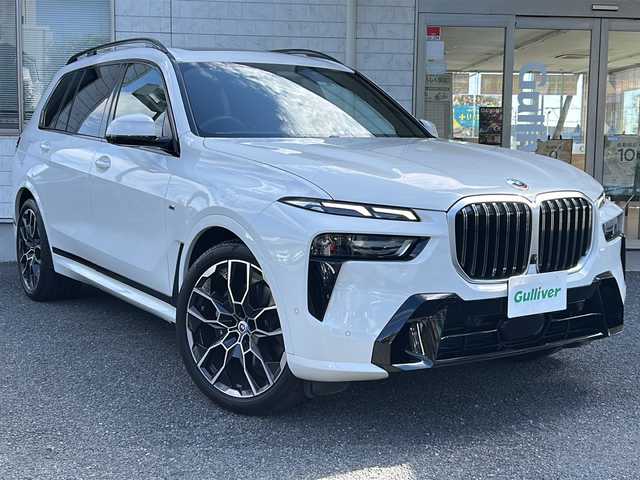 ＢＭＷ ＢＭＷ Ｘ７ xDrive40d Mスポーツ 埼玉県 2023(令5)年 1.3万km アルピンホワイトⅢ ワンオーナー/純正ナビ/スカイラウンジサンルーフ/パノラマルーフ/エアサス/保冷カップ/ハーマンカードンスピーカー/全席シートヒーター/シートマッサージDN席/ステアリングヒーター/パワーシート/パーキングアシスト/ブラインドスポットモニター/全方位カメラ/衝突軽減/側面衝突警告/レーンアシスト/追従クルコン/TRC/ダウンヒルアシストコントロール/置くだけ充電/AFS/LEDヘッド/パドルシフト/電格ミラー/保証書/スペア１