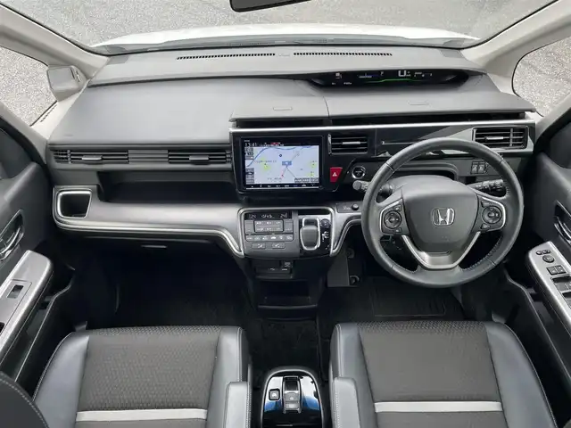ホンダ ステップワゴン スパーダ eHEV G EXホンダS 大阪府 2021(令3)年 1.4万km プラチナホワイトパール ワンオーナー/ハーフレーザー/前席シートヒーター/純正ＳＤナビ＆フルセグＴＶ/（ＤＶＤ＆ＣＤ＆ＳＤ＆ＢＴ＆ＵＳＢ）/バックカメラ/ビルトインＥＴＣ２．０/前後ドライブレコーダー/衝突軽減ブレーキ/アダプティブクルーズコントロール/先行車発進通知/車線逸脱防止/レーンキープアシスト/標識検知/両側パワースライドドア/オートホールド/純正エアロ/純正１６inアルミホイール/オートライト/ＬＥＤライト/フォグランプ/電動格納ミラー/スマートキー/プッシュスタート/Ｗ＆サイド＆カーテンエアバッグ/横滑り防止装置/ＡＢＳ/ドアバイザー/フロアマット/新車保証書/取扱説明書（車両＆ナビ）/スマートスペアキー有