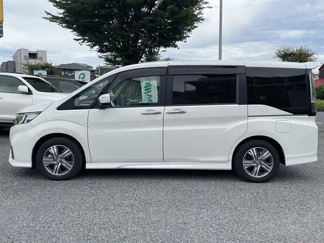 ホンダ ステップワゴン スパーダ eHEV G EXホンダS 大阪府 2021(令3)年 1.4万km プラチナホワイトパール ワンオーナー/ハーフレーザー/前席シートヒーター/純正ＳＤナビ＆フルセグＴＶ/（ＤＶＤ＆ＣＤ＆ＳＤ＆ＢＴ＆ＵＳＢ）/バックカメラ/ビルトインＥＴＣ２．０/前後ドライブレコーダー/衝突軽減ブレーキ/アダプティブクルーズコントロール/先行車発進通知/車線逸脱防止/レーンキープアシスト/標識検知/両側パワースライドドア/オートホールド/純正エアロ/純正１６inアルミホイール/オートライト/ＬＥＤライト/フォグランプ/電動格納ミラー/スマートキー/プッシュスタート/Ｗ＆サイド＆カーテンエアバッグ/横滑り防止装置/ＡＢＳ/ドアバイザー/フロアマット/新車保証書/取扱説明書（車両＆ナビ）/スマートスペアキー有