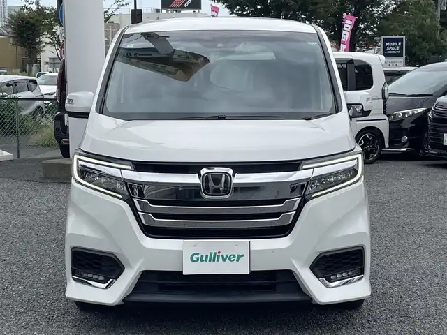 ホンダ ステップワゴン スパーダ eHEV G EXホンダS 大阪府 2021(令3)年 1.4万km プラチナホワイトパール ワンオーナー/ハーフレーザー/前席シートヒーター/純正ＳＤナビ＆フルセグＴＶ/（ＤＶＤ＆ＣＤ＆ＳＤ＆ＢＴ＆ＵＳＢ）/バックカメラ/ビルトインＥＴＣ２．０/前後ドライブレコーダー/衝突軽減ブレーキ/アダプティブクルーズコントロール/先行車発進通知/車線逸脱防止/レーンキープアシスト/標識検知/両側パワースライドドア/オートホールド/純正エアロ/純正１６inアルミホイール/オートライト/ＬＥＤライト/フォグランプ/電動格納ミラー/スマートキー/プッシュスタート/Ｗ＆サイド＆カーテンエアバッグ/横滑り防止装置/ＡＢＳ/ドアバイザー/フロアマット/新車保証書/取扱説明書（車両＆ナビ）/スマートスペアキー有