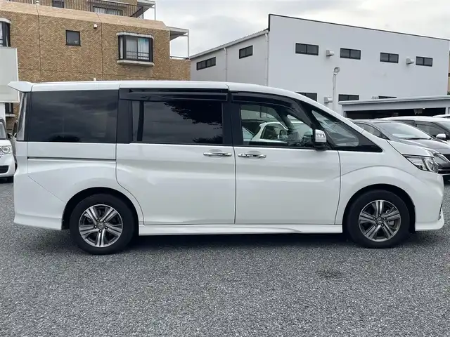 ホンダ ステップワゴン スパーダ eHEV G EXホンダS 大阪府 2021(令3)年 1.4万km プラチナホワイトパール ワンオーナー/ハーフレーザー/前席シートヒーター/純正ＳＤナビ＆フルセグＴＶ/（ＤＶＤ＆ＣＤ＆ＳＤ＆ＢＴ＆ＵＳＢ）/バックカメラ/ビルトインＥＴＣ２．０/前後ドライブレコーダー/衝突軽減ブレーキ/アダプティブクルーズコントロール/先行車発進通知/車線逸脱防止/レーンキープアシスト/標識検知/両側パワースライドドア/オートホールド/純正エアロ/純正１６inアルミホイール/オートライト/ＬＥＤライト/フォグランプ/電動格納ミラー/スマートキー/プッシュスタート/Ｗ＆サイド＆カーテンエアバッグ/横滑り防止装置/ＡＢＳ/ドアバイザー/フロアマット/新車保証書/取扱説明書（車両＆ナビ）/スマートスペアキー有