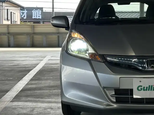 ホンダ フィット ハイブリット スマート セレクション 静岡県 2011(平23)年 2.9万km アラバスターシルバーメタリック 社外7インチナビ/（CD/DVD/FM/AM/USB）/ワンセグTV/バックカメラ/オートライト/ETC車載器/スマートキー/クルーズコントロール/オートエアコン/純正15AW