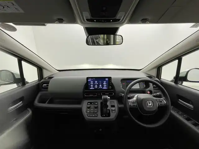 ホンダ フリード ハイブリット e:HEV クロスター 群馬県 2025(令7)年 0.1千km ベージュ 登録済未使用車　純正９インチメモリナビ　両側パワースライドドア　レーダークルーズコントロール　ＢＳＭ　バックカメラ　ステアリングリモコン　シートヒーター　オートライト　プッシュスタート　スマートキー