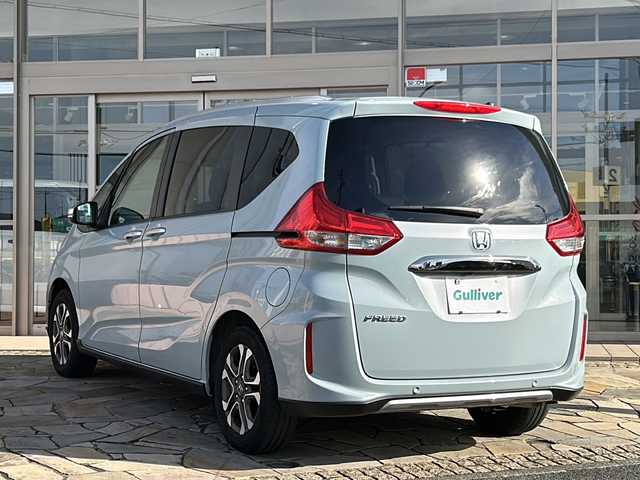 ホンダ フリード クロスター 静岡県 2022(令4)年 2万km フィヨルドミストパール 純正ナビ（CD DVD AM FM フルセグTV SD Bluetooth）バックカメラ/クルーズコントロール追従あり/両側パワースライドドア/シートヒーター/ドライブレコーダー/ホンダセンシング/ETC/ウォークスルー/LEDヘッドライト/純正アルミホイール/プリクラッシュ/ステアリングリモコン/アイドリングストップ