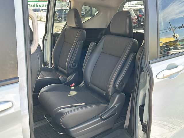 ホンダ フリード クロスター 静岡県 2022(令4)年 2万km フィヨルドミストパール 純正ナビ（CD DVD AM FM フルセグTV SD Bluetooth）バックカメラ/クルーズコントロール追従あり/両側パワースライドドア/シートヒーター/ドライブレコーダー/ホンダセンシング/ETC/ウォークスルー/LEDヘッドライト/純正アルミホイール/プリクラッシュ/ステアリングリモコン/アイドリングストップ