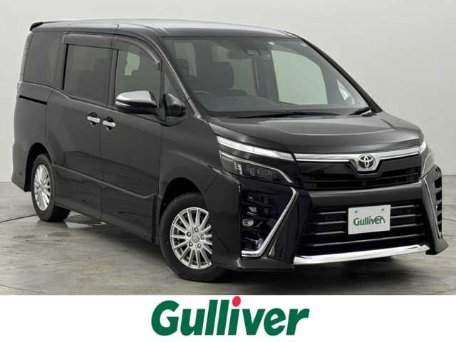 トヨタ ヴォクシー ZS 煌Ⅱ 福岡県 2020(令2)年 6.8万km イナズマスパーキングブラックガラスフレーク 純正１２．１型後席モニター　/純正９型ナビ　/バックカメラ　/ＥＴＣ２．０　/前後ドラレコ　/クルコン　/コーナーセンサー　/衝突軽減ブレーキ　/レーンキープ　/ＰＫＳＢ　/ＭＴモード付き　/両側電動スライドドア　/ＬＥＤヘッドライト