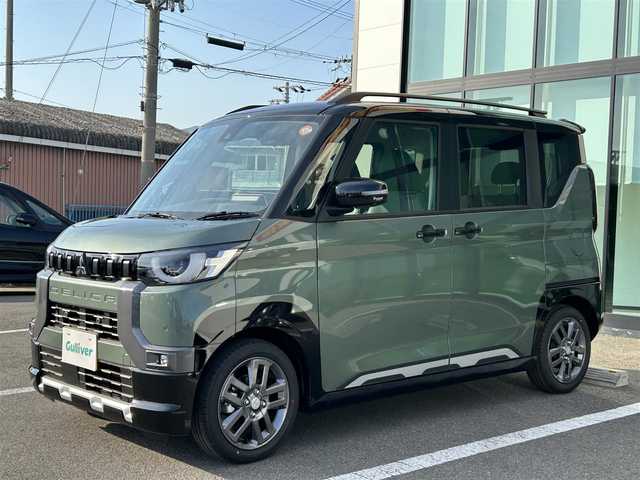 三菱 デリカミニ T プレミアム 和歌山県 2025(令7)年 0.1万km未満 緑Ⅱ 未使用車/純正9インチディスプレイオーディオ/（AppleCarPlay/AndroidAuto）/全方位カメラ/衝突軽減ブレーキ/レーンキープアシスト/前後コーナーセンサー/ダウンヒルアシスト/クルーズコントロール/横滑り防止/オートライト/デジタルインナーミラー/両側パワースライド/ハンズフリーオートスライド/前席シートヒーター/ステアリングヒーター/LEDヘッドライト/フォグランプ/純正15インチアルミ