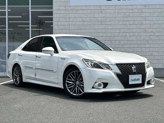 トヨタ クラウン ハイブリッド アスリートS 愛知県 2015(平27)年 9.3万km ホワイトパールクリスタルシャイン 登録時92707km/ワンオーナー/ＨＩＤヘッドライト/純正１８インチアルミ/バックカメラ/純正ナビＴＶ/ＣＤ／ＤＶＤ／ＢＴ　フルセグ/ドライブレコーダー/前席シートヒーター/前席パワーシート/ステアリングヒーター/純正フロアマット/クルーズコントロール/コーナーセンサー/ETC/保証書/取扱説明書/スマートキー×2