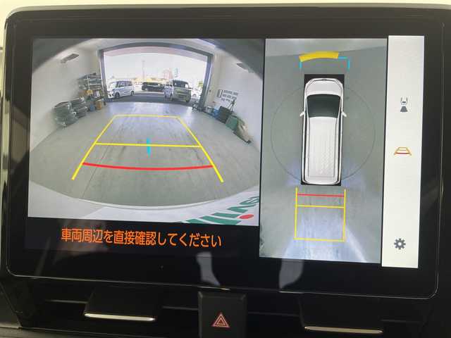 トヨタ ノア ハイブリッド 愛知県 2024(令6)年 0.8万km ホワイトパールクリスタルシャイン 純正10型ナビ/・AppleCarPlay/・Bluetooth/・フルセグ/・DVD/・CD/フリップダウンモニター/ETC/パノラマミックビューモニター/前後ドライブレコーダー/両側パワースライドドア/追従型クルコン/ABS/BSM/レーンキープアシスト/横滑り防止装置/イモビライザー/オートライト/オートマチックハイビーム/衝突軽減システム/LEDヘッドライト/純正アルミホイール