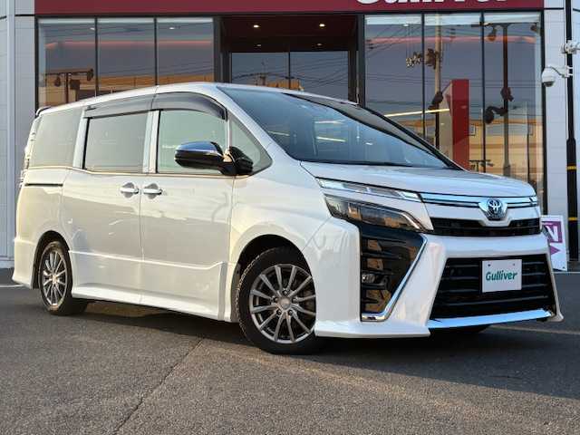 トヨタ ヴォクシー ハイブリッド ZS 煌Ⅱ 宮城県 2020(令2)年 5.7万km ホワイトパールクリスタルシャイン 登録時走行距離56155km/・ＡＬＰＩＮＥ１０ｉｎｔナビ/　CD/DVD/BT/・フルセグテレビ/・衝突軽減ブレーキ/・バックカメラ/・両側パワースライドドア/・コーナーセンサー前後/・ドライブレコーダー前後/・前席シートヒーター/・クルーズコントロール/・プッシュスタート/・スマートキー/・純正フロアマット