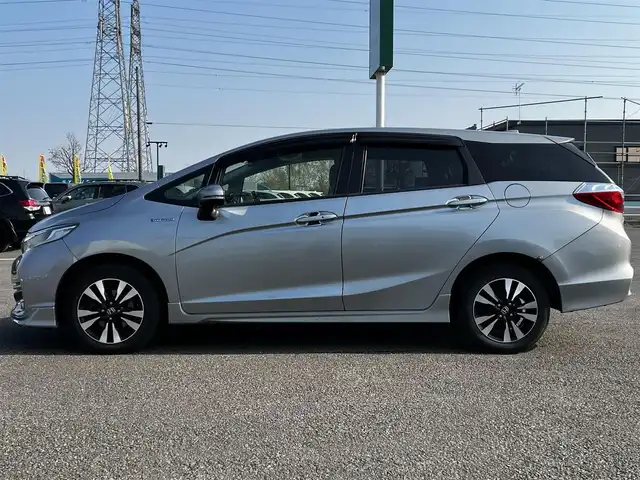 ホンダ シャトル ハイブリッド X 道央・札幌 2015(平27)年 15万km ティンテッドシルバーM ４WD/ワンオーナー/純正ディーラーOPナビ/CD/DVD/BT/フルセグ/衝突被害軽減ブレーキ/横滑り防止装置/クルーズコントロール/バックカメラ/ETC/ドライブレコーダー/アイドリングストップ/ECONモード/ワイパーデアイサー/ハーフレザーシート/革巻きステアリング/ステアリングリモコン/パドルシフト/MTモード付AT/プッシュスタート/スマートキー/HIDヘッドライト/オートライト/フォグランプ/電動格納ミラー/ヒーテッドドアミラー/ウィンカーミラー/純正フロアマット/ドアバイザー/スペアキー/純正エンジンスターター/純正AW付冬タイヤ積込/185/60/R15/2023年/山5mm