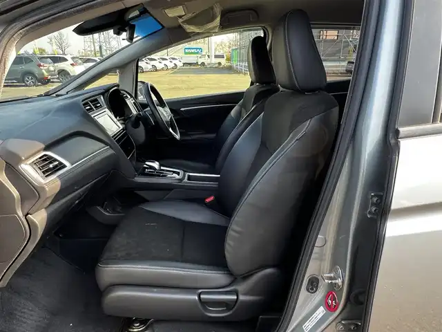 ホンダ シャトル ハイブリッド X 道央・札幌 2015(平27)年 15万km ティンテッドシルバーM ４WD/ワンオーナー/純正ディーラーOPナビ/CD/DVD/BT/フルセグ/衝突被害軽減ブレーキ/横滑り防止装置/クルーズコントロール/バックカメラ/ETC/ドライブレコーダー/アイドリングストップ/ECONモード/ワイパーデアイサー/ハーフレザーシート/革巻きステアリング/ステアリングリモコン/パドルシフト/MTモード付AT/プッシュスタート/スマートキー/HIDヘッドライト/オートライト/フォグランプ/電動格納ミラー/ヒーテッドドアミラー/ウィンカーミラー/純正フロアマット/ドアバイザー/スペアキー/純正エンジンスターター/純正AW付冬タイヤ積込/185/60/R15/2023年/山5mm