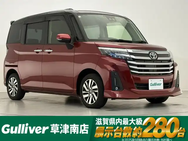 トヨタ ルーミー カスタムG 滋賀県 2020(令2)年 3.8万km ブラックマイカメタリック/ファイアークォーツレッドメタリック 純正7インチナビ/【Bluetooth/CD/DVD/フルセグTV】/両側パワースライドドア/バックカメラ/クリアランスソナー/追従クルーズコントロール/レーンディパーチャーアラート/衝突軽減ブレーキ/前後ドライブレコーダー/ビルトインETC/プッシュスタート/スマートキー/ステアリングリモコン
