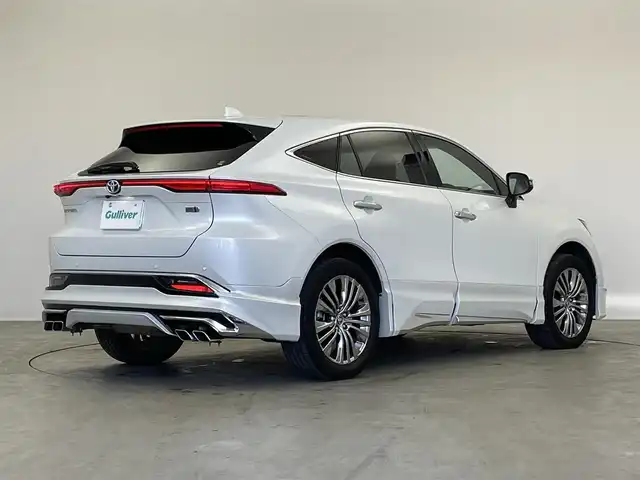 トヨタ ハリアー ハイブリッド Z レザーパッケージ 埼玉県 2023(令5)年 4.5万km プラチナホワイトパールマイカ 調光パノラマルーフ/モデリスタエアロ/JBLサウンド/デジタルインナーミラー/トヨタセーフティーセンス/プリクラッシュセーフティ/レーダークルーズコントロール/レーンディパーチャーアラート/インテリジェントクリアランスソナー/ブラインドスポットモニター/ロードサイドアシスト/純正１２．３インチディスプレイオーディオ/DTV BT USB/パノラミックビューモニター/レザーシート/前席パワーシート/シートヒーター/ベンチレーション/ステアリングヒーター/運転席シートメモリー/パワーバックドア/LEDオートライト/オートマチックハイビーム/ビルトインETC2.0