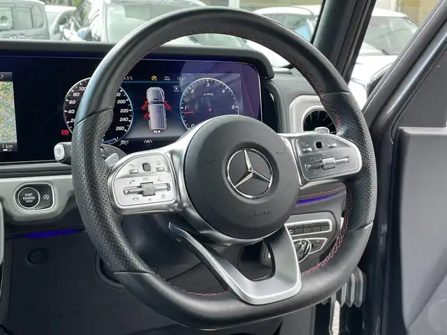 メルセデス・ベンツ ゲレンデヴァーゲン Ｇ４００ｄ AMGライン 東京都 2021(令3)年 3万km マグネタイトブラック ラグジュアリーパッケージ（・ガラススライディングルーフ・ブルメスターサラウンドサウンドシステム（15スピーカー））/レーダーセーフティパッケージ（・アクティブブレーキアシスト・PRE-SEFE・PRE-SAFEサウンド・アウティブレーンキーピングアシスト・ブラインドスポットアシスト・アクティブディスタンスアシストディストロニック・衝突警告・道路標識アシスト・パークトロニック）/アダプティブダンピングシステム/ワンオーナー/保証書・取説・スマートキー×2/革巻きステア・オートチルト・パドルシフト/アイドリングストップ/アダプティブクルーズコントロール/赤ステッチ入り黒レザーシート・レッドシートベルト/前席メモリ付パワーシート・全席シートヒーター/COMANDシステム・12.3インチコックピットディスプレイ/HDDナビ（１２。３インチ）・フルセグTV/SD/USB×2/BT/AppleCarPlay/AndroidAuto/ビルトインETC（2.0）/ユピテル前後ドラレコ/ダイナミックセレクト/AMG20インチアルミ/マルチビームLEDライト・オートライト・リアフォグ/トノカバー/背面タイヤハードカバー