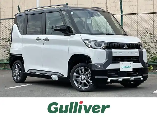 三菱 デリカミニ T プレミアム 東京都 2025(令7)年 0.1千km 白Ⅱ 届出済未使用車/純正ディスプレィ/・BluetoothAudio/USB/・AppleCarPlay＆AndroidAuto/アラウンドニューモニター/ｅアシスト/（運転支援機能）/・衝突被害軽減ブレーキ/・踏み間違い衝突防止アシスト/・車線逸脱警報システム/・オートマチックハイビーム/・標識認識警報/マイプロパイロット/レーダークルーズコントロ―ル/LEDヘッドライト/ロールサンシェード/デジタルインナーミラー/プッシュエンジンスタート/保証書＆取説