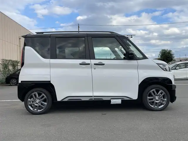 三菱 デリカミニ T プレミアム 東京都 2025(令7)年 0.1千km 白Ⅱ 届出済未使用車/純正ディスプレィ/・BluetoothAudio/USB/・AppleCarPlay＆AndroidAuto/アラウンドニューモニター/ｅアシスト/（運転支援機能）/・衝突被害軽減ブレーキ/・踏み間違い衝突防止アシスト/・車線逸脱警報システム/・オートマチックハイビーム/・標識認識警報/マイプロパイロット/レーダークルーズコントロ―ル/LEDヘッドライト/ロールサンシェード/デジタルインナーミラー/プッシュエンジンスタート/保証書＆取説