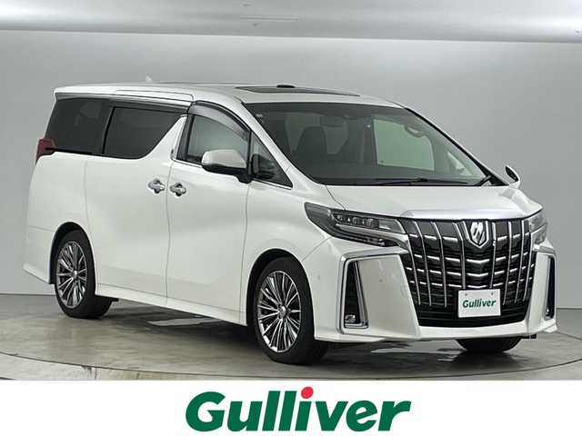 トヨタ アルファード S Cパッケージ 愛知県 2018(平30)年 7.4万km ホワイトパールクリスタルシャイン 禁煙車/純正10インチナビ/（CD/DVD/Bluetooth/フルセグTV/HDMI/USB)/バックカメラ/JBLサウンド/サンルーフ/フリップダウンモニター/トヨタセーフティセンス/・プリクラッシュセーフティ/・レーントレーシングアシスト/・パーキングセンサーブレーキ/・クリアランスソナー/・ブラインドスポットモニター/・レーダークルーズコントロール/・オートマチックハイビーム/・ロードサインアシスト/ETC2.0/前後ドライブレコーダー/ステアリングヒーター/パワーシート/メモリシート/シートベンチレーション/シートヒーター/オットマン/両側パワースライドドア/パワーバックドア/19インチアルミホイール/LEDヘッドライト/フロントフォグランプ/スマートキー/プッシュスタート/純正フロアマット/横滑り防止装置/ステアリングスイッチ/オートホールド/電子パーキングブレーキ
