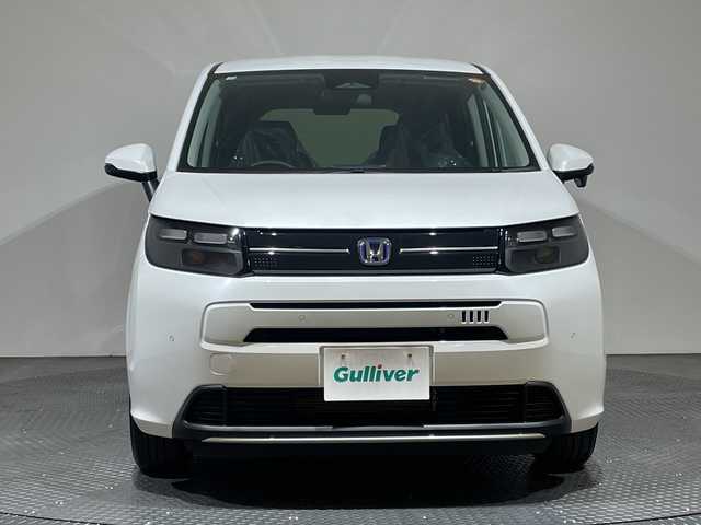 ホンダ フリード ハイブリット e:HEV AIR EX 愛媛県 2025(令7)年 0.1千km プラチナホワイトパール e:HEV エアー　EX　2LB40P4　6人　9インチナビ　LXM-242ZFNI(207680円)/純正９型ナビ　両側電動スライドドア　バックカメラ　フルセグ　Ｂｌｕｅｔｏｏｔｈ　衝突被害軽減ブレーキ　アダプティブクルーズコントロール　レーンアシスト　シートヒーター　前後コーナーセンサー　禁煙車