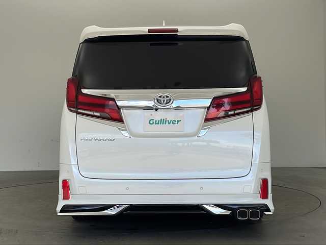 トヨタ アルファード S Cパッケージ 兵庫県 2019(平31)年 7万km ホワイトパールクリスタルシャイン ・純正ナビ&TV&CD&SD&BT&HDMI&USB/・バックカメラ/・モデリスタエアロ/・社外２０インチアルミホイール/・サンルーフ/・前後ドライブレコーダー/・革シート/・ビルトインETC/・運転席メモリー付きパワー/・前席パワーシート/・前席シートヒーター/・ベンチレーション/・2列目オットマン/・助手席オットマン/・ステアリングヒーター/・社外車高調/・電子パーキングブレーキ/・オートホールド/・横滑り防止装置/・ウッドコンビステアリング/・ステアリングスイッチ/・両側パワースライドドア/・パワーバックドア/・左右独立エアコン/・後席エアコン/・社外デジタルインナーミラー/・トヨタセーフティセンス/・レーンレーシングアシスト/・クリアランスソナー/・パーキングサポートブレーキ/・プリクラッシュセーフティ/・ロードサインアシスト/・レーダークルーズコントロール/・オートマチックハイビーム/・先行者発進告知/・自動防眩ミラー/・3眼LEDライト/・LEDフォグランプ/・シーケンシャルウィンカー/・オートワイパー/・オートライト/・フォグランプ/・ウインカーミラー/・ドアバイザー/・純正フロアマット