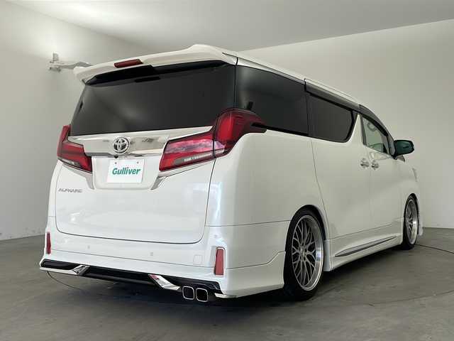 トヨタ アルファード S Cパッケージ 兵庫県 2019(平31)年 7万km ホワイトパールクリスタルシャイン ・純正ナビ&TV&CD&SD&BT&HDMI&USB/・バックカメラ/・モデリスタエアロ/・社外２０インチアルミホイール/・サンルーフ/・前後ドライブレコーダー/・革シート/・ビルトインETC/・運転席メモリー付きパワー/・前席パワーシート/・前席シートヒーター/・ベンチレーション/・2列目オットマン/・助手席オットマン/・ステアリングヒーター/・社外車高調/・電子パーキングブレーキ/・オートホールド/・横滑り防止装置/・ウッドコンビステアリング/・ステアリングスイッチ/・両側パワースライドドア/・パワーバックドア/・左右独立エアコン/・後席エアコン/・社外デジタルインナーミラー/・トヨタセーフティセンス/・レーンレーシングアシスト/・クリアランスソナー/・パーキングサポートブレーキ/・プリクラッシュセーフティ/・ロードサインアシスト/・レーダークルーズコントロール/・オートマチックハイビーム/・先行者発進告知/・自動防眩ミラー/・3眼LEDライト/・LEDフォグランプ/・シーケンシャルウィンカー/・オートワイパー/・オートライト/・フォグランプ/・ウインカーミラー/・ドアバイザー/・純正フロアマット