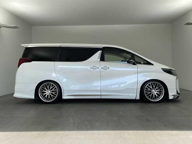 トヨタ アルファード S Cパッケージ 兵庫県 2019(平31)年 7万km ホワイトパールクリスタルシャイン ・純正ナビ&TV&CD&SD&BT&HDMI&USB/・バックカメラ/・モデリスタエアロ/・社外２０インチアルミホイール/・サンルーフ/・前後ドライブレコーダー/・革シート/・ビルトインETC/・運転席メモリー付きパワー/・前席パワーシート/・前席シートヒーター/・ベンチレーション/・2列目オットマン/・助手席オットマン/・ステアリングヒーター/・社外車高調/・電子パーキングブレーキ/・オートホールド/・横滑り防止装置/・ウッドコンビステアリング/・ステアリングスイッチ/・両側パワースライドドア/・パワーバックドア/・左右独立エアコン/・後席エアコン/・社外デジタルインナーミラー/・トヨタセーフティセンス/・レーンレーシングアシスト/・クリアランスソナー/・パーキングサポートブレーキ/・プリクラッシュセーフティ/・ロードサインアシスト/・レーダークルーズコントロール/・オートマチックハイビーム/・先行者発進告知/・自動防眩ミラー/・3眼LEDライト/・LEDフォグランプ/・シーケンシャルウィンカー/・オートワイパー/・オートライト/・フォグランプ/・ウインカーミラー/・ドアバイザー/・純正フロアマット