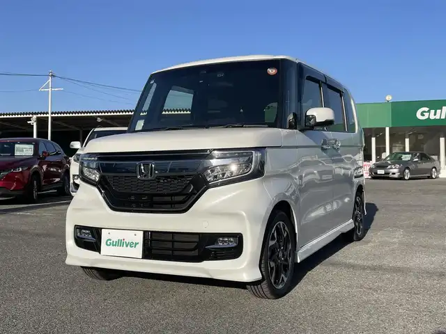 ホンダ Ｎ ＢＯＸ カスタム G L ターボ ホンダセンシング 千葉県 2019(令1)年 1.3万km プラチナホワイトパール ホンダセンシング/・衝突軽減ブレーキ/・レーンキープアシスト/・アダプティブクルーズコントロール/・オートマチックハイビーム/純正8インチSDナビ【VXU-207NBi】/・CD/DVD/MSV/Bluetooth/フルセグ/バックカメラ/ハーフレザーシート/前席シートヒーター/スマートキー/パドルシフト/純正LEDヘッドライト/フォグランプ/純正15インチアルミホイール/社外ドライブレコーダー/ビルトインETC/本革巻きステアリング/ドアバイザー/サイド＆カーテンエアバッグ/新車時保証書＆取扱説明書