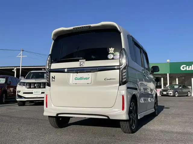 ホンダ Ｎ ＢＯＸ カスタム G L ターボ ホンダセンシング 千葉県 2019(令1)年 1.3万km プラチナホワイトパール ホンダセンシング/・衝突軽減ブレーキ/・レーンキープアシスト/・アダプティブクルーズコントロール/・オートマチックハイビーム/純正8インチSDナビ【VXU-207NBi】/・CD/DVD/MSV/Bluetooth/フルセグ/バックカメラ/ハーフレザーシート/前席シートヒーター/スマートキー/パドルシフト/純正LEDヘッドライト/フォグランプ/純正15インチアルミホイール/社外ドライブレコーダー/ビルトインETC/本革巻きステアリング/ドアバイザー/サイド＆カーテンエアバッグ/新車時保証書＆取扱説明書