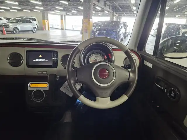 スズキ ラパン X 長崎県 2014(平26)年 5.4万km ミルクティーベージュメタリック 純正MOPナビ/ワンセグTV/バックカメラ/HIDヘッドランプ/オートライト/オートエアコン/革巻きステアリング/キルティングレザー調シート/純正14インチアルミホイール/スマートキー/イモビライザー/プッシュエンジンスタート/禁煙車