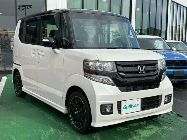 ホンダ Ｎ ＢＯＸ カスタム G ターボ Lパッケージ 長崎県 2015(平27)年 9万km パールⅡ /純正8型ナビ/バックカメラ/（AM/FM/CD/DVD/Bluetooth/フルセグTV）//両側パワースライドドア//シティブレーキアシスト//HIDヘッドライト//純正15インチアルミ//ハーフレザー調シート//スマートキー//プッシュスタート