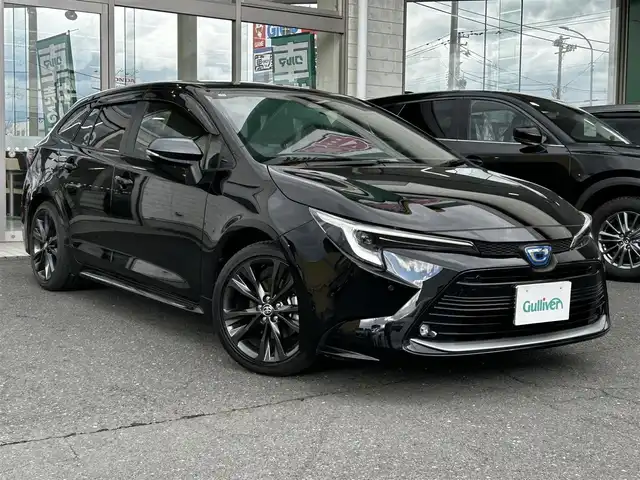 トヨタ カローラツーリング ハイブリッド ダブルバイビー 青森県 2024(令6)年 2.4万km アティチュードブラックマイカ ワンオーナー/4WD/10.5インチ純正ディスプレイオーディオ(ナビ)/(BT/フルセグ/AppleCarPlay/AndroidAuto)/ハーフレザーシート/純正エンジンスターター/寒冷地仕様/トヨタセーフティセンス/・プリクラッシュセーフティ/・レーダークルーズコントロール/・オートマチックハイビーム/・レーンディパーチャーアラート/・レーントレーシングアシスト/・ロードサインアシスト/オートライト/LEDヘッドライト/バックカメラ/ビルトインETC2.0/スペアキー/ヘッドライトレベライザー/記録簿(R7)/新車時保証書/取扱説明書