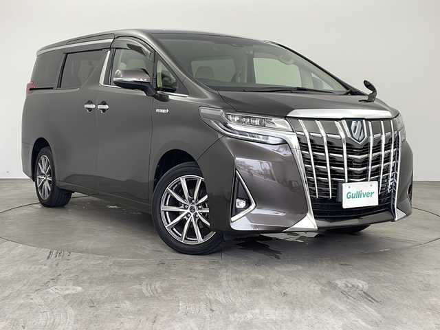 トヨタ アルファードハイブリット X 兵庫県 2019(令1)年 6.6万km グラファイトM ・ワンオーナー車/・純正１０インチナビ/TV/Ｂｌｕｅｔｏｏｔｈ/CD/DVD/・純正１２．１インチリアフリップダウンモニター/・アダクティブクルーズコントロール/・デジタルインナーミラー/・純正フロアマット/・両側パワースライドドア/・バックカメラ/・スマートキー/・ＬＥＤヘッドライト/・LEDフォグランプ/・オートライト/・オートマチックハイビーム/・前後ドライブレコーダー/・ビルトインＥＴＣ/・１８インチsmack managed　AW/・8人乗り/・トヨタセーフティーセンス/・プリクラッシュセーフティ/・レーントレーシングアシスト/・横滑り防止装置/・電動パーキングブレーキ/・オートブレーキホールド/・ステアリングスイッチ