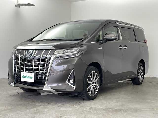 トヨタ アルファードハイブリット X 兵庫県 2019(令1)年 6.6万km グラファイトM ・ワンオーナー車/・純正１０インチナビ/TV/Ｂｌｕｅｔｏｏｔｈ/CD/DVD/・純正１２．１インチリアフリップダウンモニター/・アダクティブクルーズコントロール/・デジタルインナーミラー/・純正フロアマット/・両側パワースライドドア/・バックカメラ/・スマートキー/・ＬＥＤヘッドライト/・LEDフォグランプ/・オートライト/・オートマチックハイビーム/・前後ドライブレコーダー/・ビルトインＥＴＣ/・１８インチsmack managed　AW/・8人乗り/・トヨタセーフティーセンス/・プリクラッシュセーフティ/・レーントレーシングアシスト/・横滑り防止装置/・電動パーキングブレーキ/・オートブレーキホールド/・ステアリングスイッチ