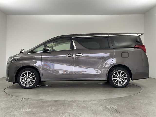 トヨタ アルファードハイブリット X 兵庫県 2019(令1)年 6.6万km グラファイトM ・ワンオーナー車/・純正１０インチナビ/TV/Ｂｌｕｅｔｏｏｔｈ/CD/DVD/・純正１２．１インチリアフリップダウンモニター/・アダクティブクルーズコントロール/・デジタルインナーミラー/・純正フロアマット/・両側パワースライドドア/・バックカメラ/・スマートキー/・ＬＥＤヘッドライト/・LEDフォグランプ/・オートライト/・オートマチックハイビーム/・前後ドライブレコーダー/・ビルトインＥＴＣ/・１８インチsmack managed　AW/・8人乗り/・トヨタセーフティーセンス/・プリクラッシュセーフティ/・レーントレーシングアシスト/・横滑り防止装置/・電動パーキングブレーキ/・オートブレーキホールド/・ステアリングスイッチ