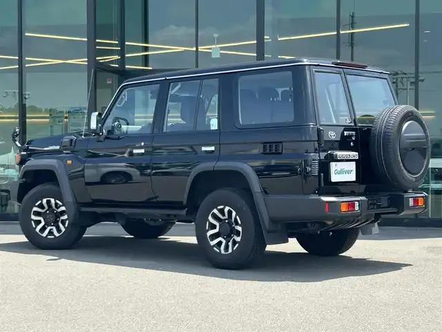 トヨタ ランドクルーザー AX 東京都 2024(令6)年 1.2万km アティチュードブラックマイカ モデリスタフロントガーニッシュ/トヨタセーフティセンス/プリクラッシュセーフティ/レーンディパーチャーアラート/オートマチックハイビーム/クルーズコントロール/ハーフレザーシート/社外ディスプレイオーディオ/バックカメラ/ETC/ドライブレコーダー/純正16インチAW