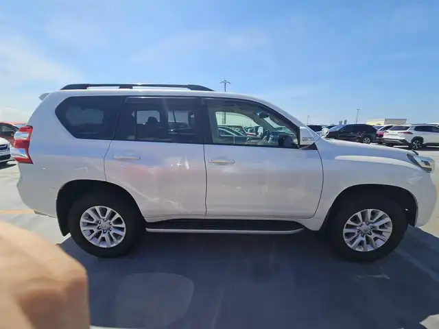 トヨタ ランドクルーザー プラド TZ 長野県 2014(平26)年 4.8万km ホワイトパールクリスタルシャイン ・寒冷地仕様/・サンルーフ/・アルパイン8型ナビ/　(Bluetooth/CD/DVD)/・フルセグTV/・バックカメラ/・ビルトインETC/・クルーズコントロール/・ダウンヒルアシストコントロール/・ヒルスタートアシストコントロール/・アクティブトラクションコントロール/・LEDヘッドランプ/・オートライト/・オートエアコン/・木目調/革巻きコンビステアリング/・ステアリングスイッチ/・レザー調シートカバー付/・純正18インチアルミホイール/・スマートエントリー/スタートシステム/・禁煙車