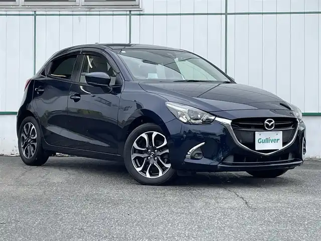 マツダ デミオ XD ツーリング 山梨県 2017(平29)年 5.4万km ディープクリスタルブルーマイカ ワンオーナー/ディーゼルターボ車/純正ナビ/バックカメラ/TV/CD/USB/BT/前席シートヒーター/クルーズコントロール/横滑り防止装置/アイドリングストップ/パドルシフト/オートライト/純正AW16インチ/ドライブレコーダー/スマートキー/スペアキー/プッシュスタート