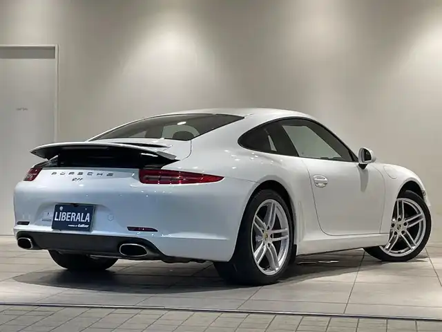 ポルシェ ９１１ カレラ 愛知県 2013(平25)年 1.4万km ピュアホワイト カレラレッド／レザーインテリア　/スポーツデザインステアリング　/シートヒーター　/ＰＤＬＳ　/電動格納ミラー/カラークレスト　/純正ナビ　/バックカメラ　/Ｂｌｕｅｔｏｏｔｈ　/フルセグＴＶ　/オートライト　/ＥＴＣ/パワーシート/アイドリングストップ