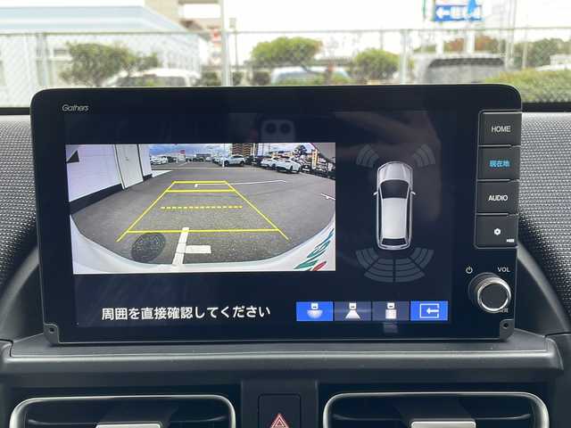 ホンダ フリード ハイブリット e:HEV AIR EX 山口県 2025(令7)年 0.1千km プラチナホワイトパール 9インチ純正ナビ　[LXM-242ZFNI]/・AM/FM/USB/Apple CarPlay/Android Auto/Bluetooth/フルセグテレビ/バックカメラ/純正LEDヘッドライト/純正アルミホイール/プッシュスタート/スペアキー/両側パワースライドドア/アイドリングストップ/Honda SENSING/　・急アクセル抑制機能/　・渋滞追従機能付アダプティブクルーズコントロール（ACC）/　・トラフィックジャムアシスト（渋滞運転支援機能）/　・ブラインドスポットインフォメーション/　・衝突軽減ブレーキ（CMBS）/　・VSA（ABS＋TCS＋横滑り抑制）/　・オートライトコントロール/　・車線維持支援システム（LKAS）/　・先行車発進お知らせ機能