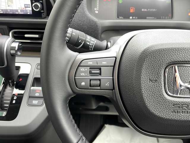 ホンダ フリード ハイブリット e:HEV AIR EX 山口県 2025(令7)年 0.1千km プラチナホワイトパール 9インチ純正ナビ　[LXM-242ZFNI]/・AM/FM/USB/Apple CarPlay/Android Auto/Bluetooth/フルセグテレビ/バックカメラ/純正LEDヘッドライト/純正アルミホイール/プッシュスタート/スペアキー/両側パワースライドドア/アイドリングストップ/Honda SENSING/　・急アクセル抑制機能/　・渋滞追従機能付アダプティブクルーズコントロール（ACC）/　・トラフィックジャムアシスト（渋滞運転支援機能）/　・ブラインドスポットインフォメーション/　・衝突軽減ブレーキ（CMBS）/　・VSA（ABS＋TCS＋横滑り抑制）/　・オートライトコントロール/　・車線維持支援システム（LKAS）/　・先行車発進お知らせ機能