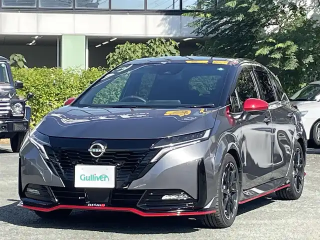 日産 オーラ ニスモ 熊本県 2022(令4)年 0.5万km ダークメタルグレー/スーパーブラック2トーン プロパイロット/ワンオーナー/プッシュスタート/純正ナビ/（フルセグTV・BTオーディオ・HDMI）/アラウンドビューモニター/ビルトインETC/純正17インチAW/LEDヘッドライト/オートライト/フォグライト/前後コーナーセンサー/横滑り防止装置/ウィンカーミラー/純正フロアマット/純正ドアバイザー/新車保証書/取扱説明書/スマートスペアキー×1本