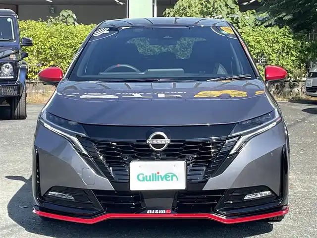 日産 オーラ ニスモ 熊本県 2022(令4)年 0.5万km ダークメタルグレー/スーパーブラック2トーン プロパイロット/ワンオーナー/プッシュスタート/純正ナビ/（フルセグTV・BTオーディオ・HDMI）/アラウンドビューモニター/ビルトインETC/純正17インチAW/LEDヘッドライト/オートライト/フォグライト/前後コーナーセンサー/横滑り防止装置/ウィンカーミラー/純正フロアマット/純正ドアバイザー/新車保証書/取扱説明書/スマートスペアキー×1本