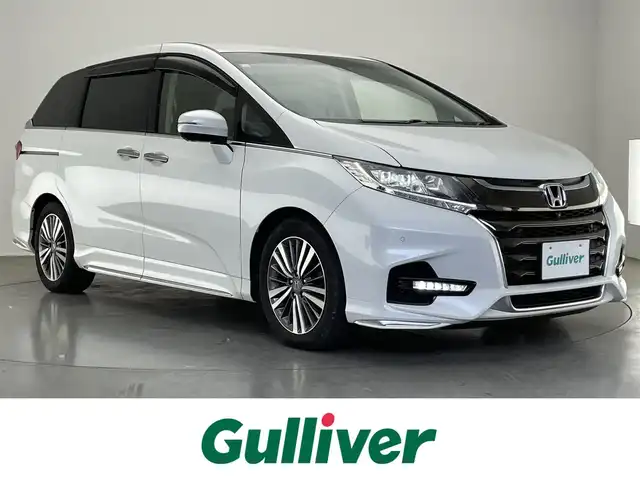 ホンダ オデッセイ アブソルート・EXホンダセンジング 愛知県 2018(平30)年 7万km プラチナホワイトパール 純正９型ナビ　フルセグＴＶ　ＨＤＭＩ　カープレイ対応　全方位カメラ　シートヒーター　前後ドラレコ　パーキングアシスト　衝突軽減　追従クルコン　ハンドル支援　コーナーセンサー　ＬＥＤオートライト　オットマン　ハーフレザー　フォグランプ　BSM　パドルシフト　禁煙車