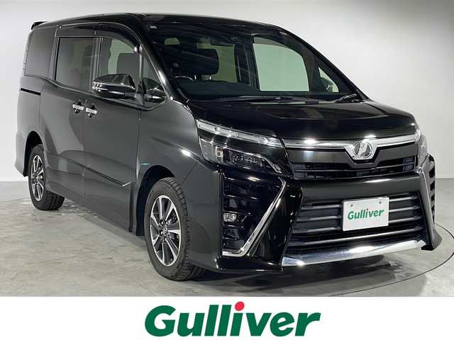 トヨタ ヴォクシー ZS 煌 福岡県 2018(平30)年 4.8万km イナズマスパーキングブラックガラスフレーク 社外7インチALPINEナビ/フルセグテレビ/バックカメラ/テレビキャンセラー/クルーズコントロール/両側パワースライドドア/スマートキー/プッシュスタートエンジン/オートライト/オートハイビーム/GPSレーダー/ステアリングスイッチ/LEDヘッドライト/フロアマット/ドアバイザー/オートドアミラー/純正16インチアルミホイール