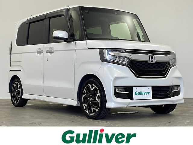 ホンダ Ｎ ＢＯＸ カスタム G L ターボ ホンダセンシング 鹿児島県 2020(令2)年 5.4万km プラチナホワイトパール ホンダセンシング　/●衝突軽減ブレーキ〈CMBS〉/●誤発進抑制機能/●歩行者事故低減ステアリング/●先行車発進お知らせ機能●標識認識機能/●路外逸脱抑制機能/●ACC〈アダプティブ・クルーズ・コントロール〉/●LKAS〈車線維持支援システム〉/●後方誤発進抑制機能/●オートハイビーム/純正８型ナビ/（フルセグ/Bluetooth/CD/DVD）/前後ドライブレコーダー　　/両側パワースライドドア/ナビ連動ドライブレコーダー　/フォグライト　/ドアバイザー　/ビルドインＥＴＣ　/後席サンシェード　/シートリフター/前席シートヒーター/オートリトラミラー